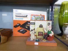 A PRINZTRONIC TOURNAMENT COLOUR PROGRAMMABLE 2000 GAME, AND A FIGURAL WALLACE AND GROMIT RADIO (2)