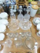 A PAIR OF GLOBE AND SHAFT SHAPED CUT GLASS DECANTERS, A PLAIN GLASS SQUARE DECANTER, FOUR SPIRIT