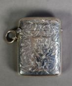 LATE VICTORIAN ENGRAVED SILVER VESTA CASE, of typical form with ring suspension, decorated with
