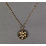 9ct GOLD FINE CHAIN NECKLACE, 18in (46cm) long and the 9ct GOLD CIRCULAR OPENWORK PENDANT, the