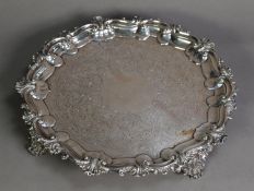 VICTORIAN ENGRAVED SILVER SALVER BY HENRY WILKINSON & Co, with scroll capped moulded border, foliate