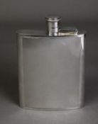 ENGINE TURNED SILVER HIP FLASK BY P H VOGEL & Co, of curved oblong form with bayonet screw top, 5 ½”