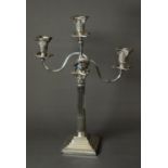 LATE VICTORIAN WEIGHTED SILVER THREE LIGHT, TWIN BRANCH CENDELABRUM, the candlestick of stop