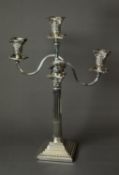 LATE VICTORIAN WEIGHTED SILVER THREE LIGHT, TWIN BRANCH CENDELABRUM, the candlestick of stop