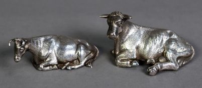 TWO FILLED SILVER MODELS OF RECUMBENT COWS, the smaller by Henry Wilkinson & Co, Sheffield 1840,