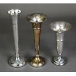 THREE SILVER SPECIMEN VASES, comprising: ONE WEIGHTED AND WITH MOULDED GIRDLE AND FLARED RIM, 5” (