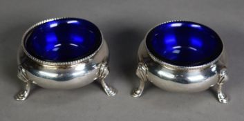 VICTORIAN PAIR OF SILVER OPEN SALTS WITH BLUE GLASS LINERS, each of plain, bellied form with