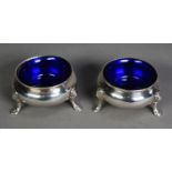 VICTORIAN PAIR OF SILVER OPEN SALTS WITH BLUE GLASS LINERS, each of plain, bellied form with