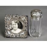 EDWARD VII PIERCED SILVER FRONTED SMALL DESK TOP PHOTOGRAPH FRAME, of square form with blue plush