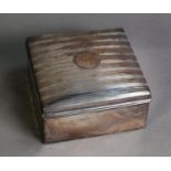GEORGE V ENGINE TURNED SILVER TABLE CIGARETTE BOX, of square form with slightly domed cover and