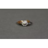 18ct GOLD AND DIAMOND CLUSTER RING, set with a small centre diamond and surround of eight tiny