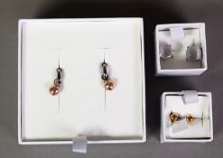 PAIR OF TI SENTO, MILANO, RHODIUM AND GOLD PLATED CIRCLET EARRINGS, each with a gold plated bead