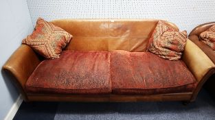 A LARGE TETRAD 'MONTANA GRAND SOFA' COVERED IN BROWN LEATHER WITH LOOSE FABRIC CUSHIONS