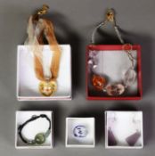 FIVE BOXED ANTICA MURRINA VENETIAN GLASS JEWELLERY ITEMS, viz a heart shaped pendant on ribbon