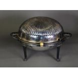 ELECTROPLATED TWO HANDLED BREAKFAST DISH AND COVER, of oval, part fluted form with revolving cover