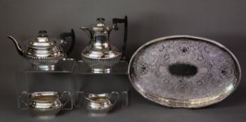 GEORGIAN STYLE FOUR PIECE ELECTROPLATED TEA SET, of part fluted, rounded oblong form with black