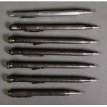 SEVEN ‘EVERSHARP’ RETRACTABLE PENCILS IN SILVERPLATED CASES, one incomplete, (7)