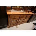MODERN MAHOGANY THREE DOOR SIDEBOARD, WITH THREE FRIEZE DRAWERS, 56 1/4" (143cm) WIDE