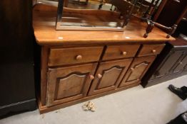 MODERN MAHOGANY THREE DOOR SIDEBOARD, WITH THREE FRIEZE DRAWERS, 56 1/4" (143cm) WIDE