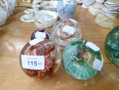TWO CAITHNESS COLOURED GLASS PAPERWEIGHTS AND TWO OTHERS (4)