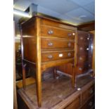 A THREE DRAWER MUSIC CHEST WITH FALL-FRONTS AND RAISED ON SQUARE TAPERING LEGS (A.F.)