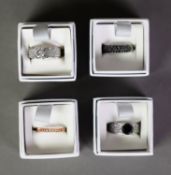 TI SENTO, MILANO, RHODIUM PLATED SILVER BROAD RING set with a solitaire cubic zirconia, each