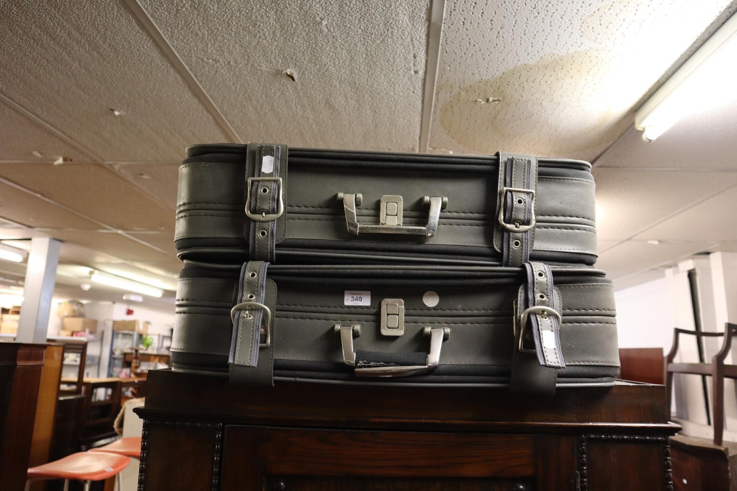 A PAIR OF GREY COLOURED ANTLER SUITCASES
