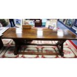 MASONIC THEMED REFECTORY TABLE, WITH SQUARE AND COMPASS SLAB ENDS AND PLANK TOP WITH BREAD-BOARD