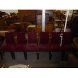 A SET OF SIX MODERN DINING CHAIRS, COVERED IN DARK RED VELVET FABRIC, HAVING DARK STAINED LEGS (A.