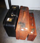 TWO VINTAGE BROWN LEATHER SUITCASES AND A BLACK LEATHER SUITCASE (3)