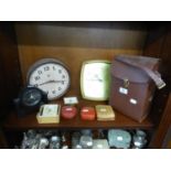 NORIS 150A COMPACT SLIDE PROJECTOR, IN CARRYING CASE AND A BATTERY WALL CLOCK AND 7 OTHER CLOCKS (8)