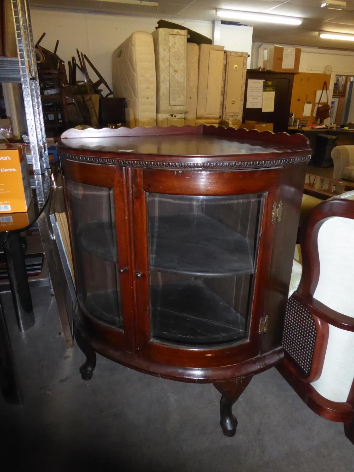A GEORGE V DOUBLE FRONTED GLAZED LOW FLOOR STANDING CORNER CABINET