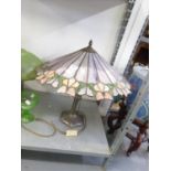 A BRONZE FINISH TIFFANY STYLE TABLE LAMP AND A CONICAL LEADED AND STAINED GLASS SHADE