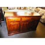 AN INDONESIAN DARK WOOD SIDEBOARD, HAVING 3 DRAWERS ABOVE 3 CUPBOARDS