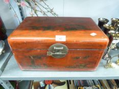 A CHINESE RED LACQUERED AND GILT DECORATED WOODEN BOX WITH METAL END HANDLES AND METAL HASPS, 16"