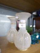 A PAIR OF 19TH CENTURY MILK GLASS VASES WITH GILT ENRICHMENTS, LOBED OVULAR FORM WITH TRUMPET NECKS,