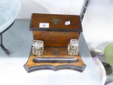 A MAHOGANY AND BLACK PAINTED INK AND LETTER STAND (A.F.)
