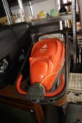 A FLYMO EASY GLIDE 300V AND A MOUNTFIELD RE 300 LAWN RAKER (2)