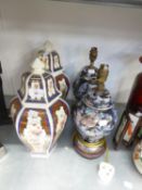 A PAIR OF CHINA HEXAGONAL VASES AND COVERS, DECORATED WITH PEACOCKS, A PAIR OF GINGER JAR STYLE