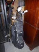 A DUNLOP GOLF BAG CONTAINING 2 x 1 WOOD, 3/5/7/9/11 WOODS, BY DONNAY EVOLUTION II AND 2 x PUTTERS,