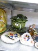 A POTTERY CABBAGE FORM TUREEN, COVER AND STAND, FOUR SMALL ITEMS OF SOUVENIR CERAMICS