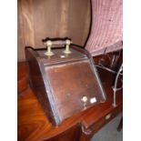 A LATE VICTORIAN WEDGE SHAPED COAL SCUTTLE (A.F.)