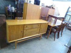 a 1960's/70's DINING ROOM SUITE OF SIX PIECES, TO INCLUDE; A DRAW-LEAF DINING TABLE, FOUR CHAIRS AND