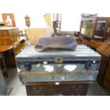 A VINTAGE AUTOMOBILE/UNIVERSITY TRUNK WITH WOODEN SLATS AND VARIOUS PAPER LABELS AND A BATTERED/WELL