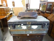 A VINTAGE AUTOMOBILE/UNIVERSITY TRUNK WITH WOODEN SLATS AND VARIOUS PAPER LABELS AND A BATTERED/WELL