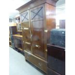 A GEORGE V MAHOGANY INLAID TWO DOOR WARDROBE, HAVING LARGE DRAWER TO THE BASE AND STEPPED CORNICE