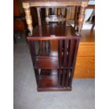 A MAHOGANY REVOLVING BOOKCASE (LACKING PIVOT)