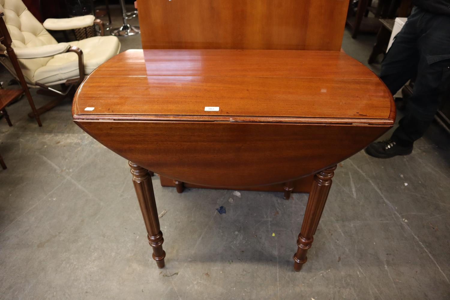 A NINETEENTH CENTURY MAHOGANY ALTERED AND ADAPTED DINING TABLE WITH DROP-FLAP 'D' ENDS