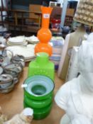 TWO 1970’s GREEN CASED AND MOULDED GLASS VASES, ANOTHER, TALLER, IN ORANGE, 18 ½” (47cm) high and