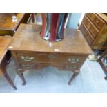 EIGHTEENTH CENTURY COUNTRY-MADE OAK LOWBOY WITH THREE DRAWERS AND SHAPED APRON, ON CABRIOLE FORELEGS